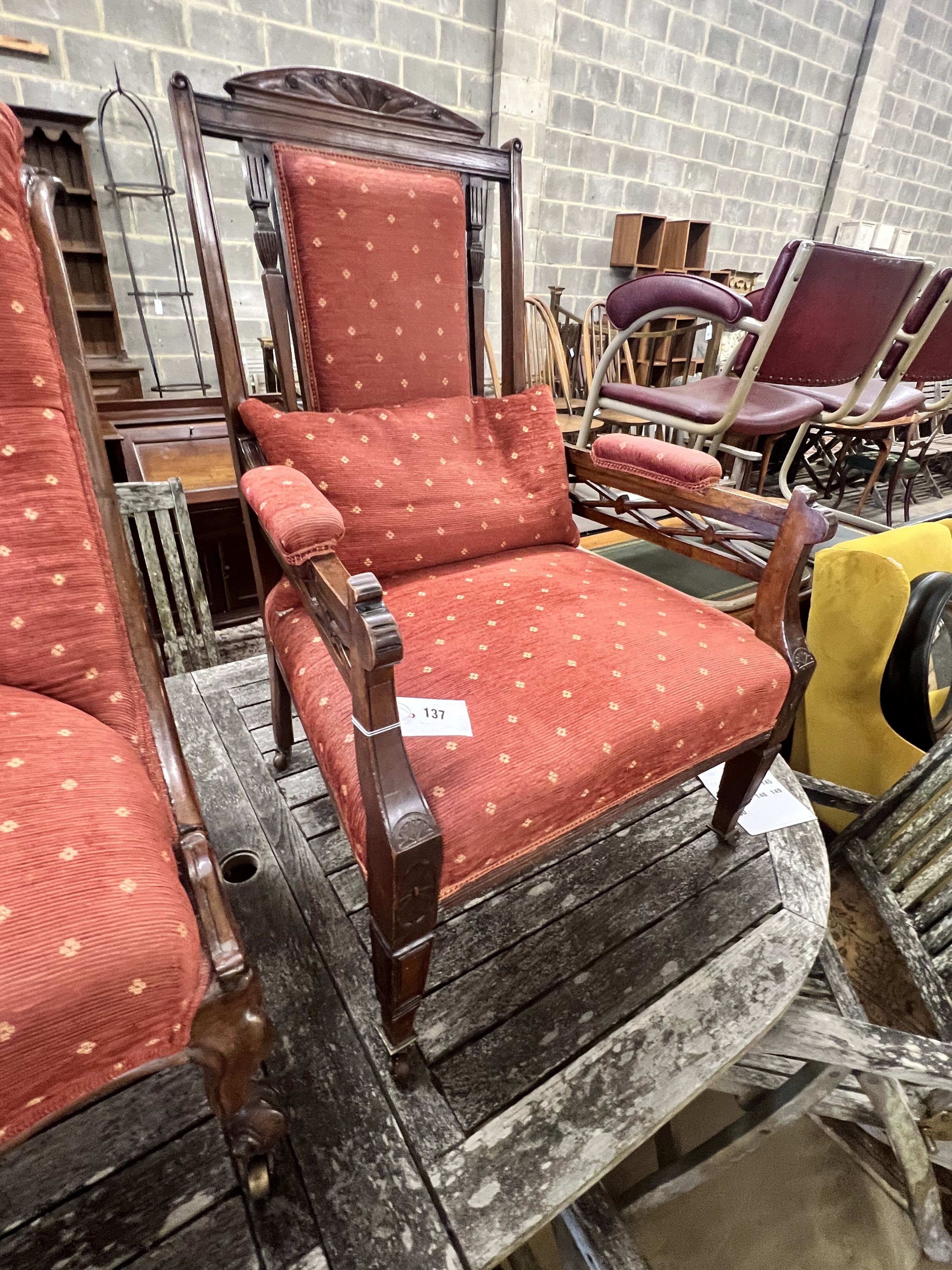 A late Victorian mahogany open armchair and an early Victorian rosewood nursing chair